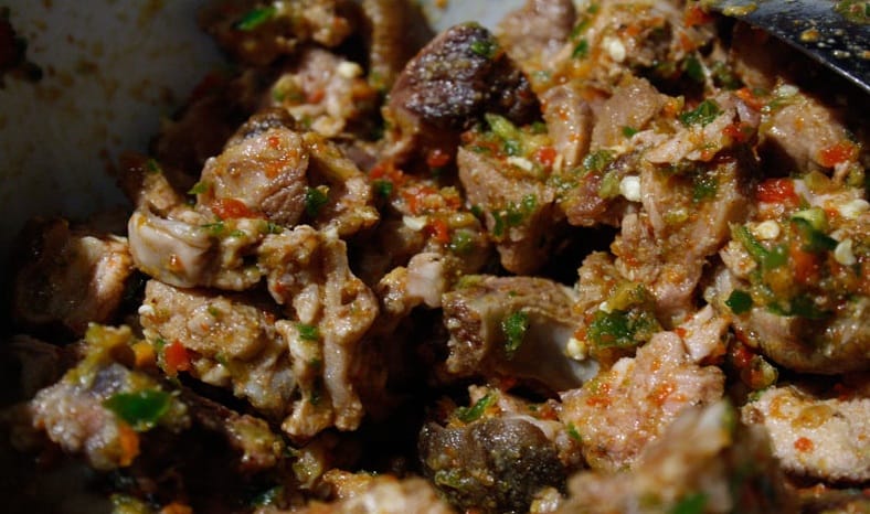 Asun, spicy grilled goat meat