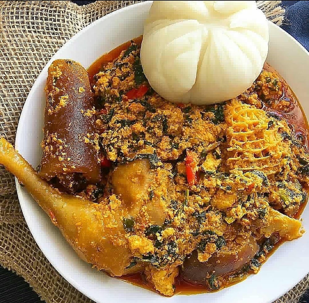 Egusi soup with pounded yam and assorted meat